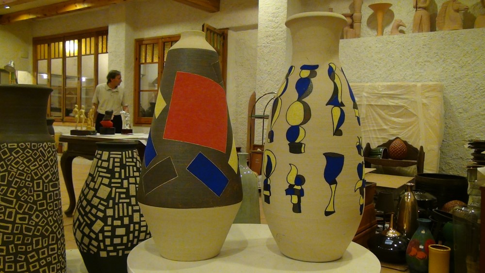four pieces painted with abstract shapes